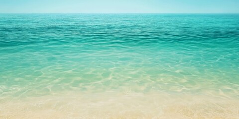 Obraz premium Clear beach water showcases a stunning gradient color transition from vibrant blue to soft light green, creating a mesmerizing view of clear beach water that s perfect for any ocean themed project.