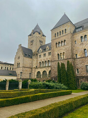 Fototapeta premium Greenery in front of an ancient stone castle