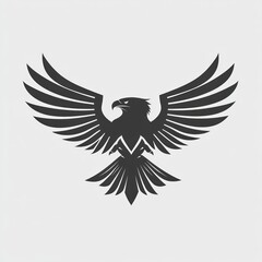 Obraz premium Majestic black eagle with wings spread wide, isolated on light gray background.