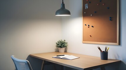 A corner study area with a minimalist desk and one light