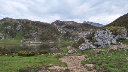 landscape with mountains, lake and sky