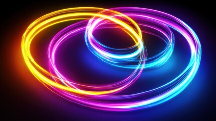 Vibrant swirling light trails in neon colors create a mesmerizing abstract pattern on a dark background.