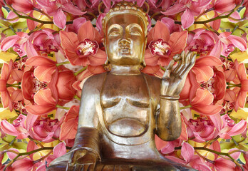 A gold Buddha on a background of orchid flowers 