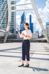 Fototapeta premium Portrait young adult business asian woman lifestyles with productive work