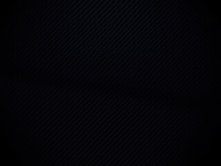 Obraz premium Dark abstract background with carbon fiber texture resembling sleek technology, dark background, black