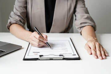 Business woman employer holding resume hiring recruit looking cv resume to hire candidates,...