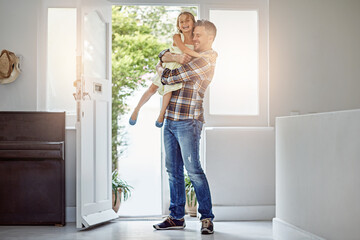 Father, happy child and hug at door in home for welcome, reunion and hello for family laughing....