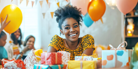  A joyful woman is seated at a beautifully decorated table filled with gifts and colorful decorations, embodying the spirit of celebration and togetherness.
