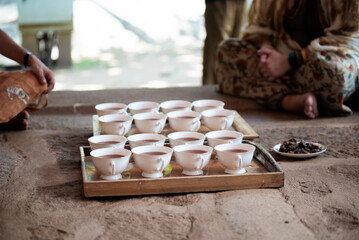 Tea ceremony with monks enjoying traditional sri lankan tea