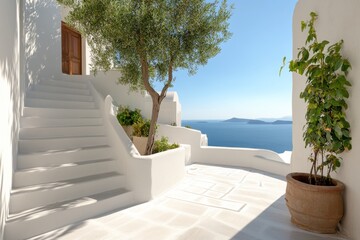 Fototapeta premium Beautiful Mediterranean courtyard features white architecture and stunning sea view at sunset