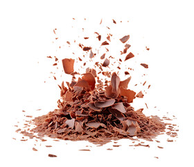 Close up of milk chocolate shavings scattered and falling, showing a dynamic explosion of fragments. Isolated cutout on transparent or white background.