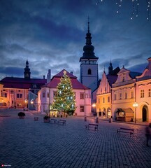 Fototapeta premium View of the pre-Christmas decorated Masaryk Square in Pelhřimov, decorated Christmas tree, nativity scene