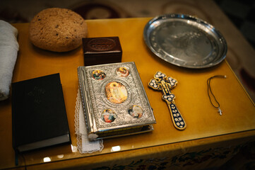 Attributes of an Orthodox priest for baptism. Baptism in the font. Child and God. Sacrament of...