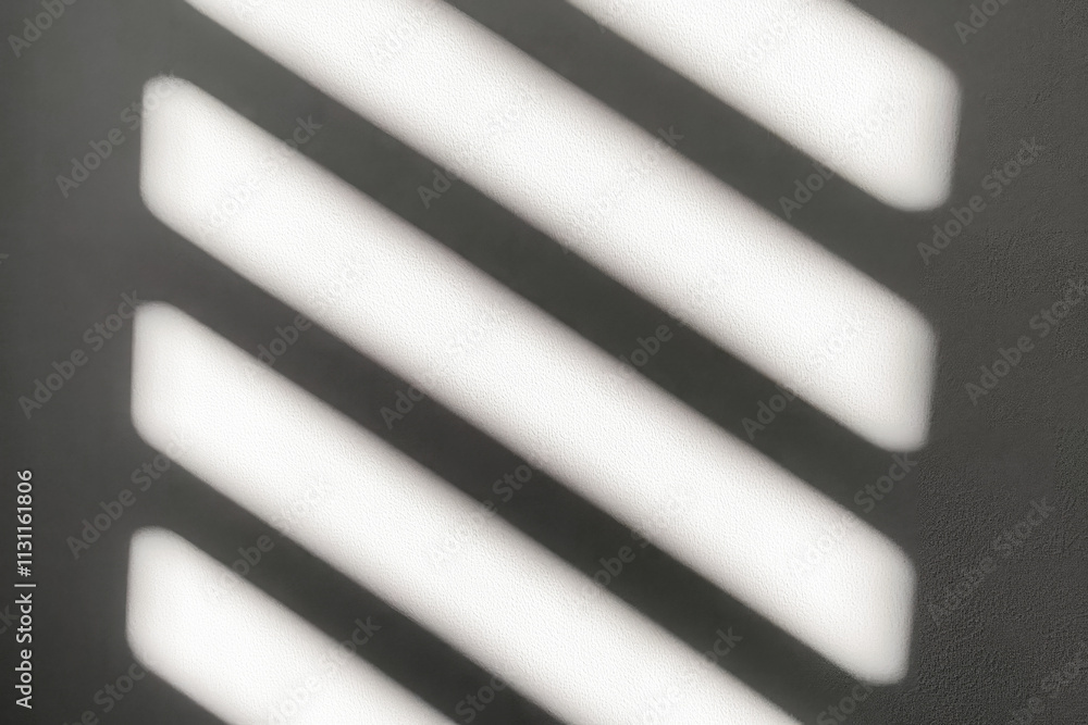 Aufkleber a visually striking play of light and shadows on a textured wall, enhancing depth with diagonal line