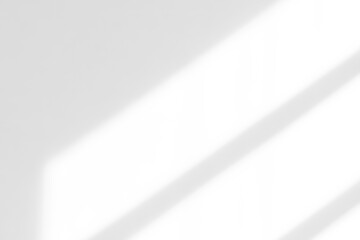 An abstract composition of soft light and shadow creating a serene atmosphere on a gentle surface.