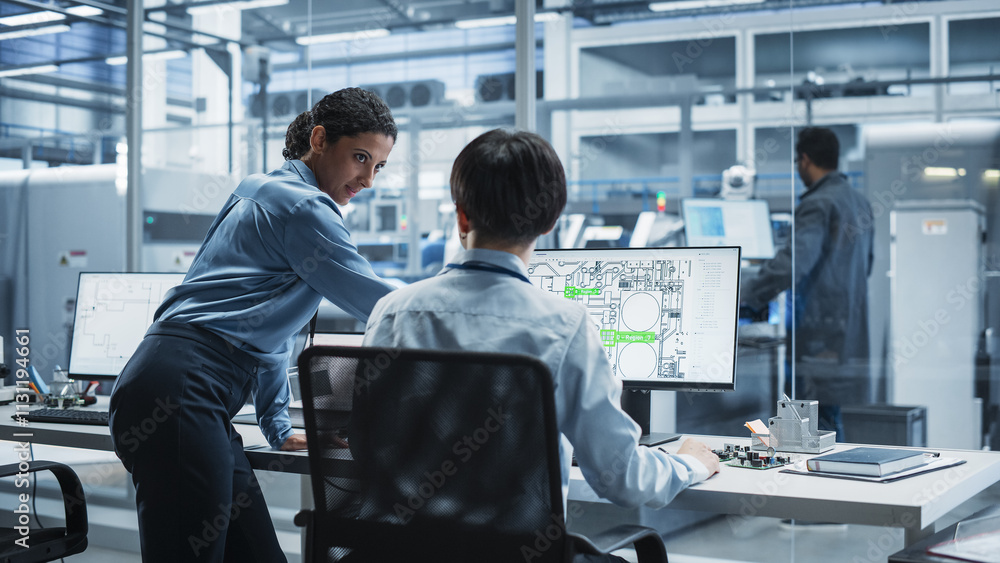 Poster hispanic female manager and asian male engineer using desktop computer with microchip blueprints at 