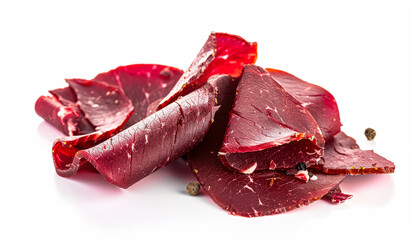 Obraz premium Piece of meat is cut into small pieces and is sitting on white background. basturma appears to be spicy and has strong aroma