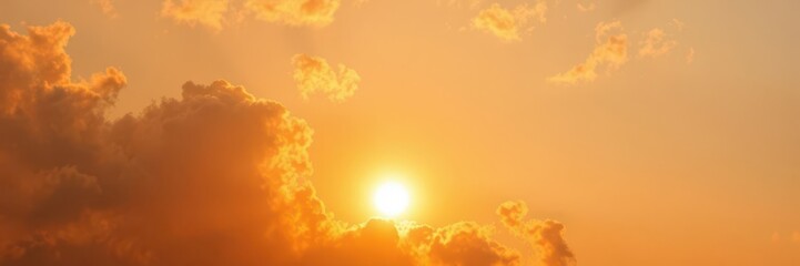 Fototapeta premium Orange sky with a bright sun, representing the effects of climate change and global warming, heat, natural disaster