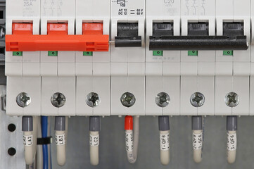 Automatic current switches to protect electrical loads. Soft focus.