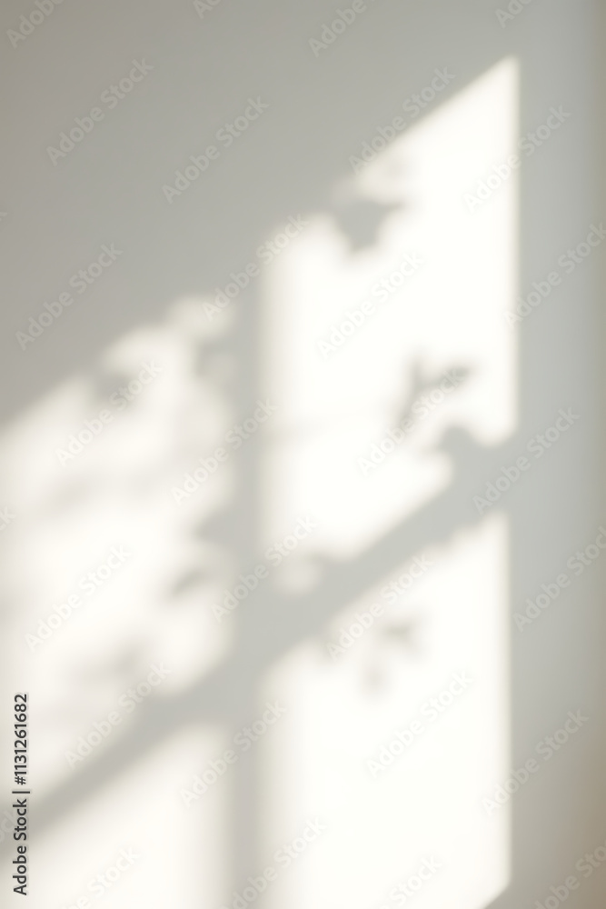 Poster soft filtered light through leafy branches creates a beautiful shadow effect on a white wall suitabl