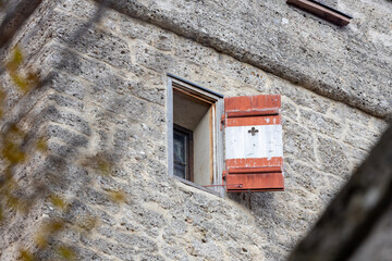 Old stone wall and colorful window frame