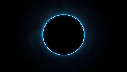 Obraz premium A glowing blue ring surrounding a dark circle against a black background.