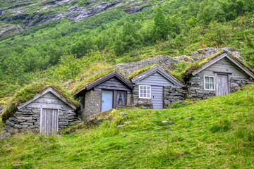 Obraz premium Orsta is the administrative centre of Ørsta Municipality, Møre og Romsdal, Norway. The village is located in the innermost part of the Ørstafjorden, surrounded by the Sunnmørsalpene mountains.