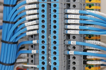 Marking of electrical wires using thermal printing on vinyl tape.