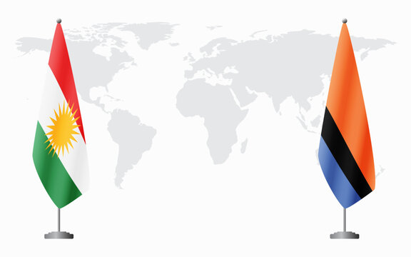 Kurdistan and Chagos Islands flags for official meeting against background of world map.
