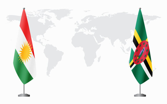 Kurdistan and Dominica flags for official meeting against background of world map.