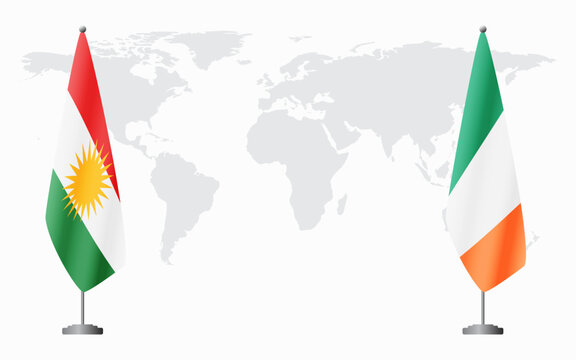 Kurdistan and Ireland flags for official meeting against background of world map.