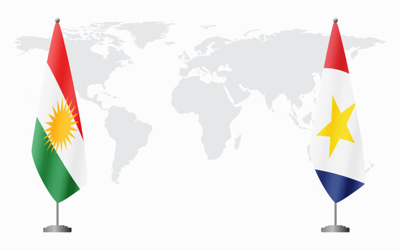 Kurdistan and Saba flags for official meeting against background of world map.