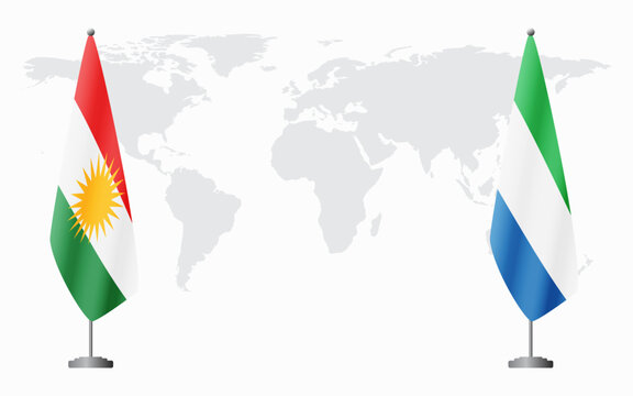 Kurdistan and Sierra Leone flags for official meeting against background of world map.