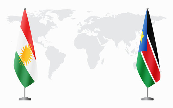 Kurdistan and South Sudan flags for official meeting against background of world map.