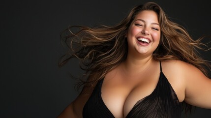 Naklejka premium A woman laughs joyfully, wearing fashionable swimwear. Her long, flowing hair dances around her as she embraces the moment. The minimalist black background emphasizes her happiness