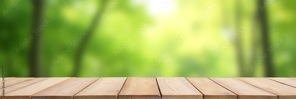 Poster a blank wooden tabletop with a blurred green garden view in the background is ideal for product disp