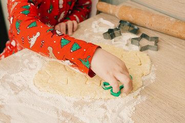 Caucasian boy crafing decorations or opening presents  at home candid shot candind shot winter holiday activities