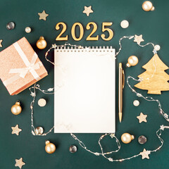 Green with white blank notepad numbers 2025. Concept of planning and setting goals for future....