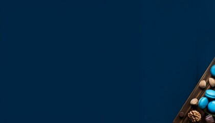 Generated image Flat lay of blue-colored comfort foods like macarons, chocolates, and pastries on a dark table