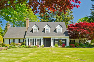 Two story luxury house with nice summer  landscape in Vancouver, Canada, North America. Day time on...