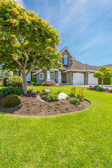 Two story luxury house with nice summer  landscape in Vancouver, Canada, North America. Day time on...