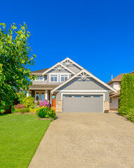 Two story luxury house with nice summer  landscape in Vancouver, Canada, North America. Day time on...