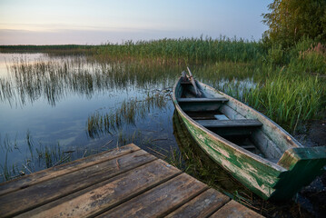Obraz premium boat on the beautiful river