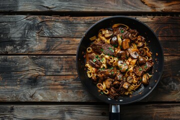 pasta linguine with fried chicken liver, top view