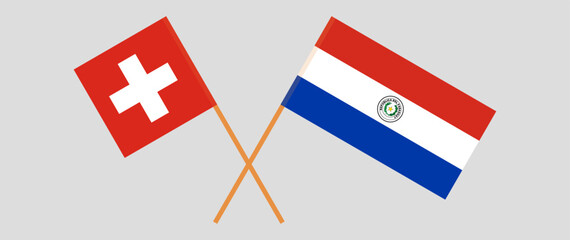 Crossed flags of Switzerland and Republic of Paraguay. Official colors. Correct proportion. Vector illustration