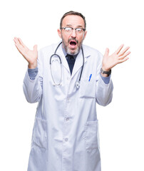 Middle age senior hoary doctor man wearing medical uniform isolated background clueless and...