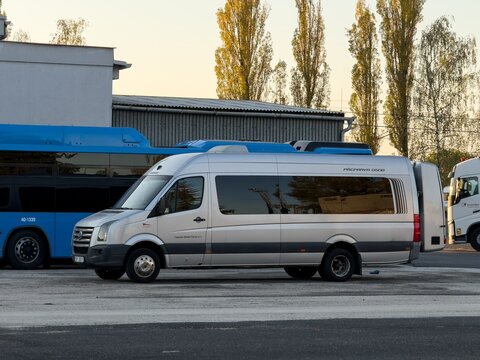 Volkswagen Crafter minibus and shuttle bus parked in service garages
