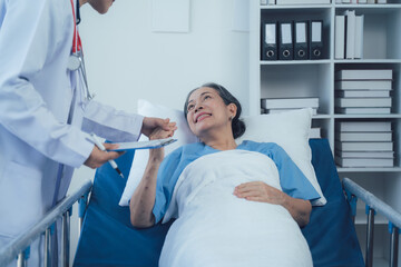Compassionate Care: A doctor attentively listens to a patient in a hospital bed, demonstrating a genuine connection of care and empathy. The image evokes a sense of reassurance and understanding.