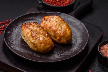 Delicious fresh fried minced fish cutlets with spices and herbs