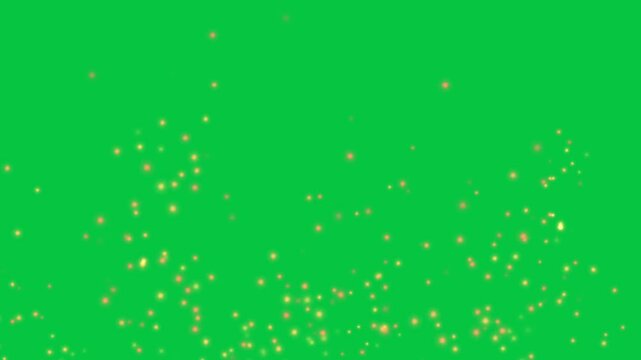 Fire ashes glowing particle flying animation isolated on green screen background 